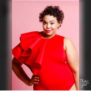 Sleeveless body suit with side ruffle